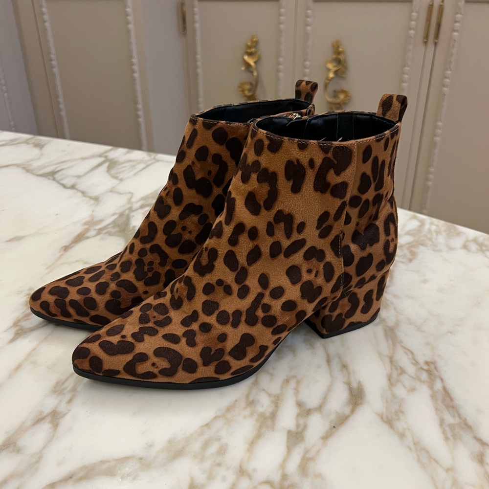 Leopard ankle boots. Women’s size 7 fits like a 6 1/2. Condition: very good